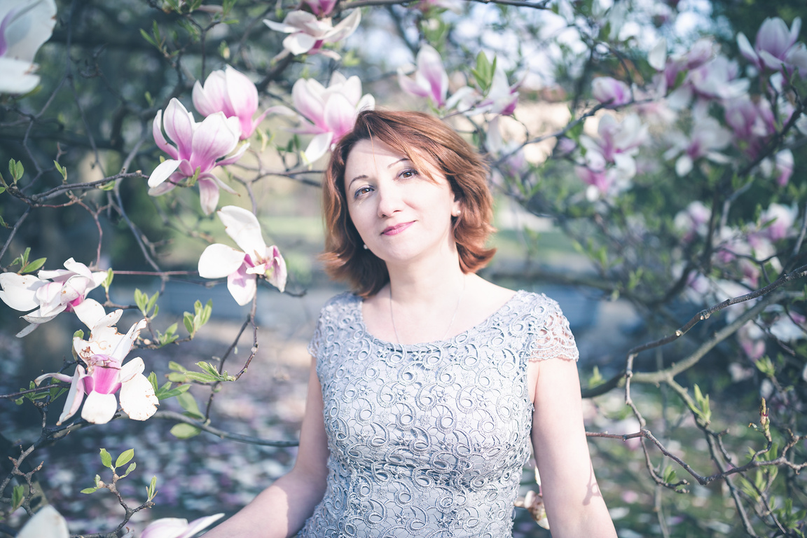 Middle Aged Woman in an Elegant Dress Outdoors 